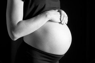 Hemera Technologies/AbleStock.com/Getty Images Regular exercise during pregnancy aids with delivery.