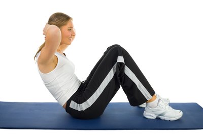 Jupiterimages/Photos.com/Getty Images Situps target your lower back muscles.