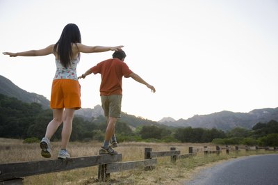 Stewart Cohen/Lifesize/Getty Images Find balance in your exercise routine for stronger knees and ankles!