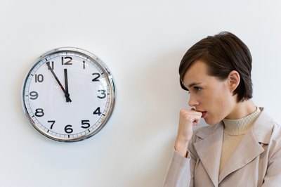 Jupiterimages/Photos.com/Getty Images Workplace conflict can make you spend more time stressing than working.