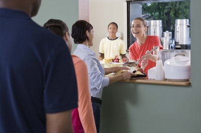 Jupiterimages/Creatas/Getty Images Fundraising groups have many ways to raise money for a sick child.
