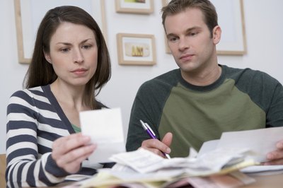 Jupiterimages/Comstock/Getty Images Money problems can put a strain on your relationships.
