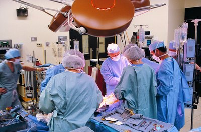 Digital Vision./Digital Vision/Getty Images Orthopedic technologists surgeons during surgery.