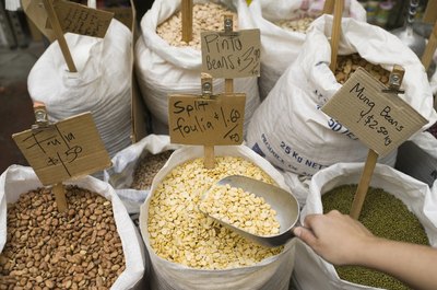Jupiterimages/BananaStock/Getty Images Whole grains and legumes are excellent sources of fiber for the healthy adult diet.