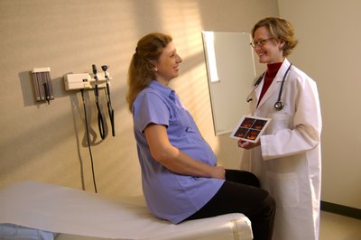 Thinkstock/Comstock/Getty Images Ultrasound technologists show moms how their babies look.