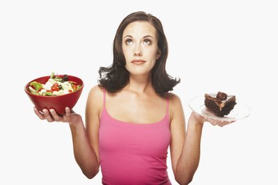 Jupiterimages/Photos.com/Getty Images Choose fiber-rich fruits and veggies over sweets.