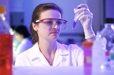 Thinkstock/Comstock/Getty Images Microbiologists study the effects of bacteria, yeasts and molds on foods.