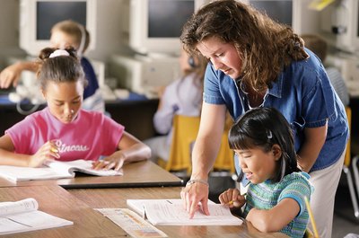 Brand X Pictures/Brand X Pictures/Getty Images There are a number of programs to enable you to pursue a rewarding career in teaching without carrying large amounts of student loan debt.