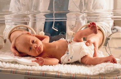 Photodisc/Photodisc/Getty Images A bachelor's degree starts your career as a neonatologist.