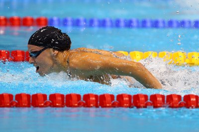 Al Bello/Getty Images Sport/Getty Images Dana Vollmer wins the 100-meter butterfly gold medal at the 2012 Olympics.