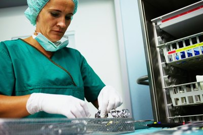Jochen Sand/Digital Vision/Getty Images Surgical techs keep germs at bay by sterilizing tools before surgeries.