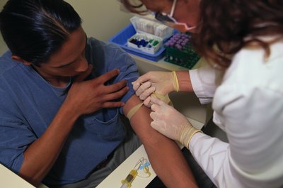 Keith Brofsky/Photodisc/Getty Images Phlebotomists need people skills as well as technical skills.