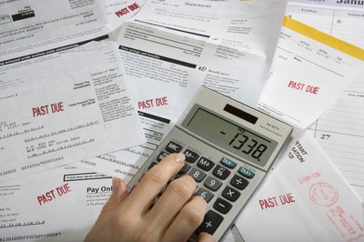 Sheer Photo, Inc/Photodisc/Getty Images A negative credit score doesn't have to stay with you.