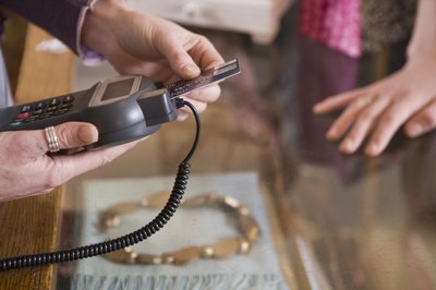 Jupiterimages/BananaStock/Getty Images Credit cards can be your friend instead of your foe.