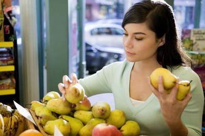 Jupiterimages/Creatas/Getty Images Pears are low in starch.