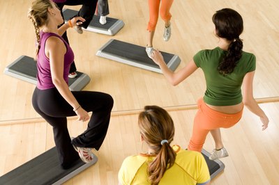IT Stock/Polka Dot/Getty Images Step yourself into shape by trying a step aerobics workout.