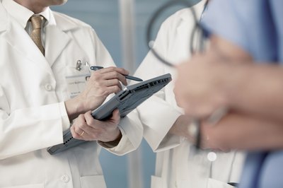 Comstock/Comstock/Getty Images Orthopedic surgeons in private practice earn more than those in a hospital setting.