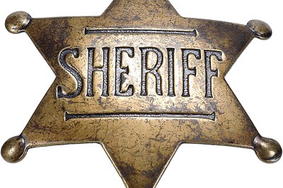 Zedcor Wholly Owned/PhotoObjects.net/Getty Images The badge may vary, but sheriffs share many duties across the nation.