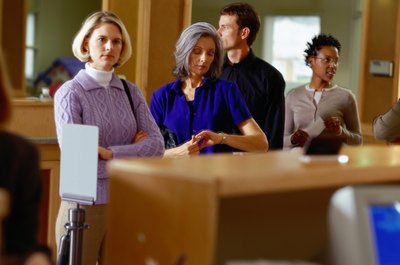 Ryan McVay/Photodisc/Getty Images Joint bank account holders might be at risk of losing their funds from a garnishment.
