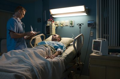 Thomas Northcut/Digital Vision/Getty Images Twelve-hour night shifts can make it difficult for a nurse to get adequate sleep.