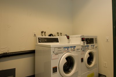 Jupiterimages/Photos.com/Getty Images Retailers will often haul away and recycle your washer and dryer with the purchase of new models.