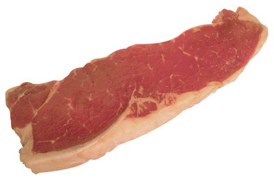 Hemera Technologies/PhotoObjects.net/Getty Images Although steak is a good source of protein, it is also high in saturated fat.