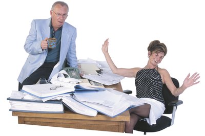 Hemera Technologies/PhotoObjects.net/Getty Images Conflict at work can mess up your whole day.