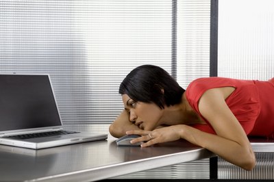 Creatas Images/Creatas/Getty Images Low workplace morale sucks the life out of you.