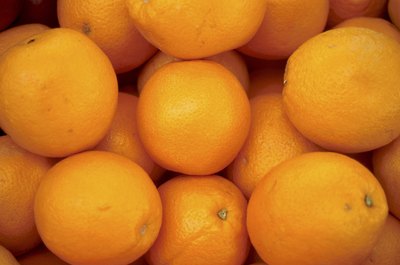 Hemera Technologies/AbleStock.com/Getty Images Oranges are a very good source of dietary fiber.