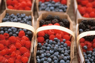 Hemera Technologies/Photos.com/Getty Images Blueberries and raspberries are high in antioxidants.