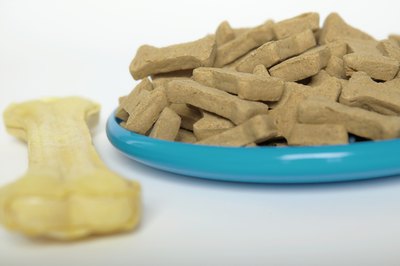 Jupiterimages/liquidlibrary/Getty Images In a bone shape, these treats keep your dog's bones healthy.