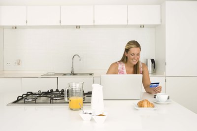 Jupiterimages/BananaStock/Getty Images Use technology to track your food spending.
