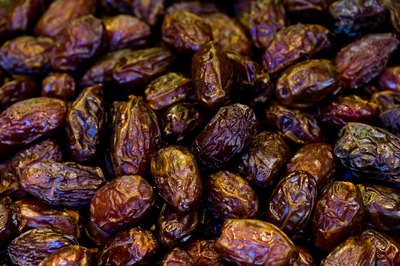 Jupiterimages/Photos.com/Getty Images Raisins and grapes can be poisonous to cats.