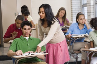 Creatas Images/Creatas/Getty Images A creative writing teacher runs workshops and mentors aspiring writers in multiple genres.