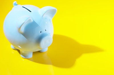 Hemera Technologies/Photos.com/Getty Images Pennies add up to dollars quickly when you invest.