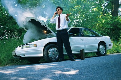 Comstock/Comstock/Getty Images Tell your employer if you are in an accident while driving for the company.
