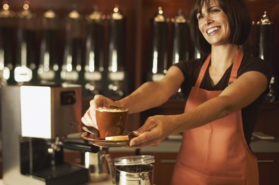 Jupiterimages/Brand X Pictures/Getty Images Managing a coffee shop can be both challenging and rewarding.