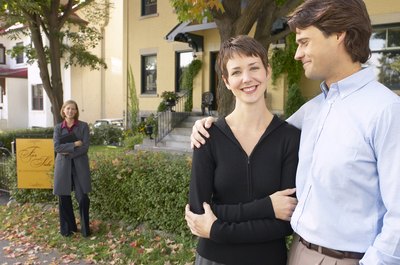 Hemera Technologies/AbleStock.com/Getty Images Prequalifying for a mortgage loan is one step toward buying a house.