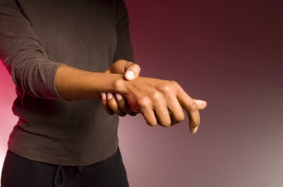 Creatas Images/Creatas/Getty Images Stronger wrists can help relieve pain.