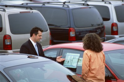 Jupiterimages/liquidlibrary/Getty Images Rental agencies sometimes have their own sales lot.