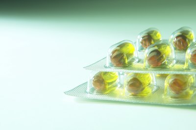 Hemera Technologies/AbleStock.com/Getty Images Steroids can be taken orally or applied directly to your pet's skin.