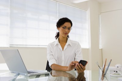 Pixland/Pixland/Getty Images Keep your work space clean so you won't lose important papers.