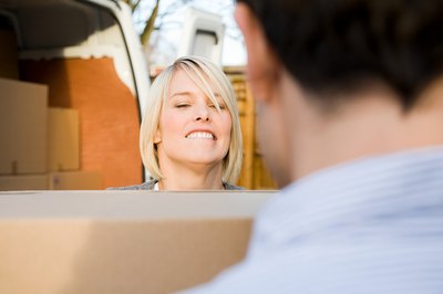 Image Source/Photodisc/Getty Images Don't leave packing and moving until the last minute.