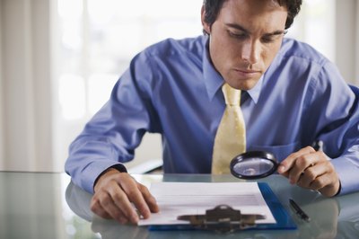 Brand X Pictures/Brand X Pictures/Getty Images Scrutinize your credit report for errors.