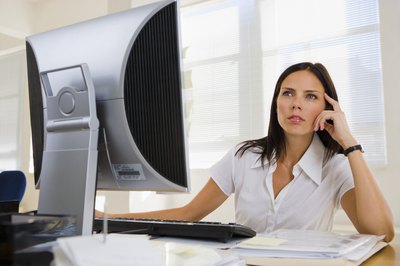 Pixland/Pixland/Getty Images Compensation analysts examine internal and external pay factors.