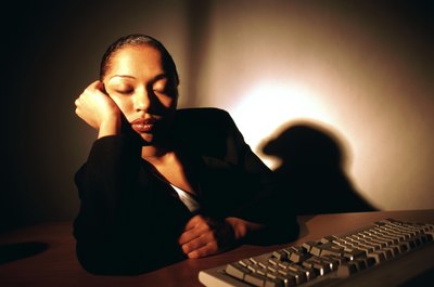 John Foxx/Stockbyte/Getty Images Working with slow coworkers can be aggravating, but do not ruin your career over it.