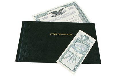 Comstock/Comstock/Getty Images Stock options and RSUs offer employees ownership positions and potential profits.