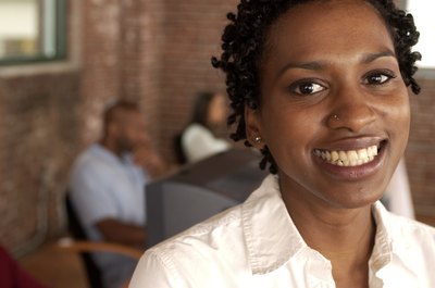 Jupiterimages/Photos.com/Getty Images If you're experiencing discrimination as a result of your race, speak up.