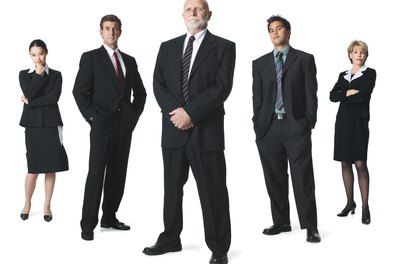 Photodisc/Photodisc/Getty Images Middle managers are the link between executive management and operations staff.