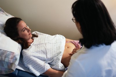 Keith Brofsky/Photodisc/Getty Images You would perform sonograms for pregnant women as an OB/GYN.